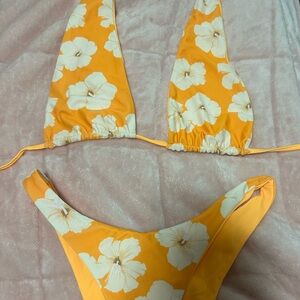2 Floral Bikini Sets in one orange the other pink